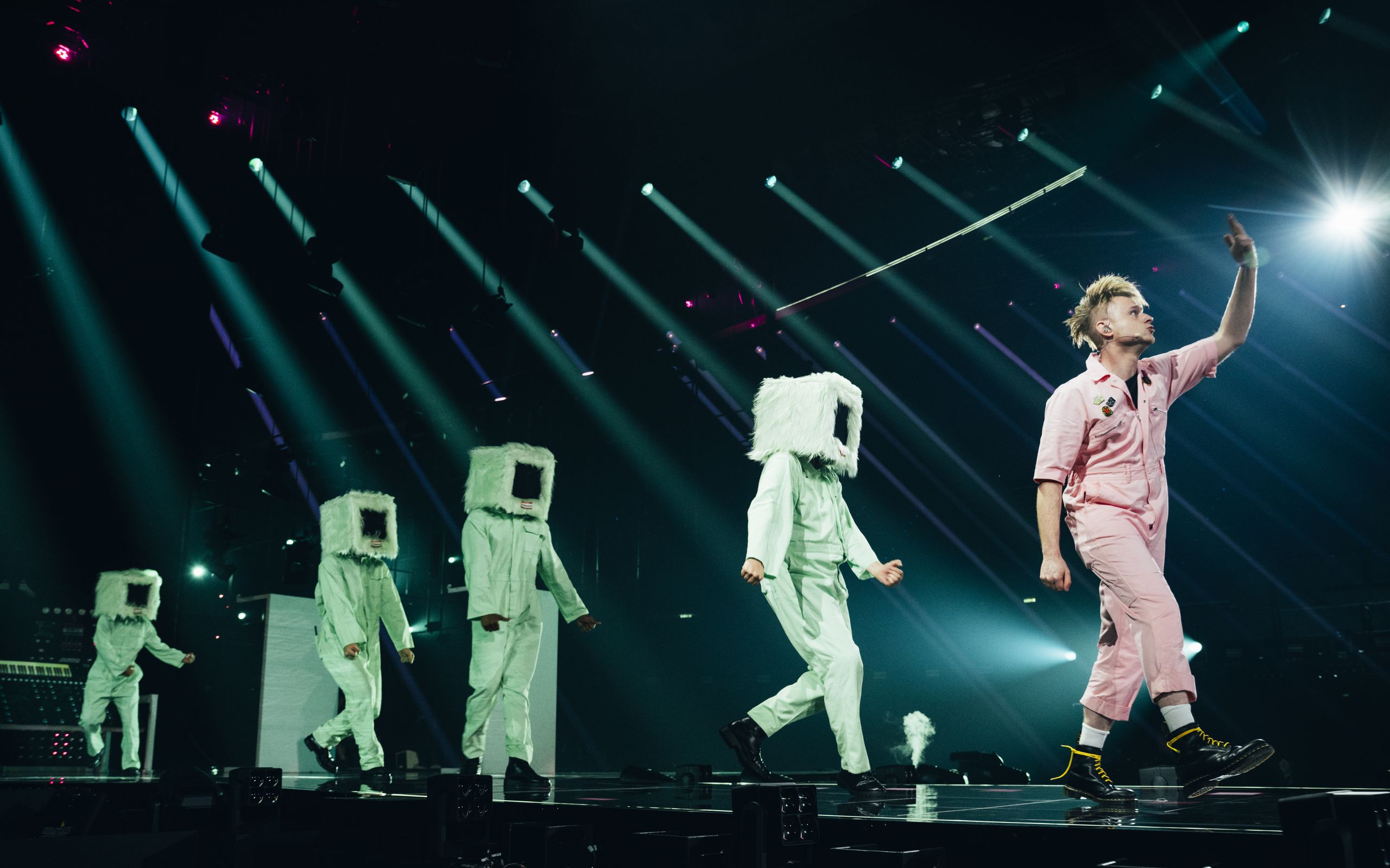 Eurovision 2026 dress rehearsal in Vienna with performers under dramatic stage lighting